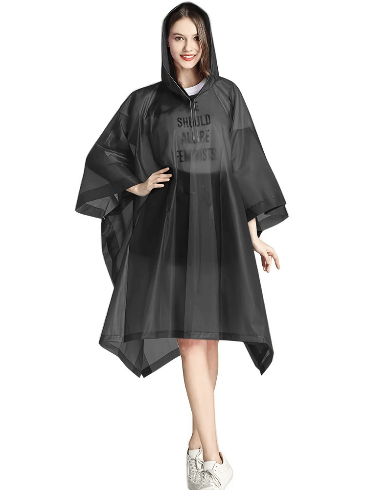 Woman wearing a black waterproof reusable transparent raincoat, SF1979 model, stylish protection for any weather.